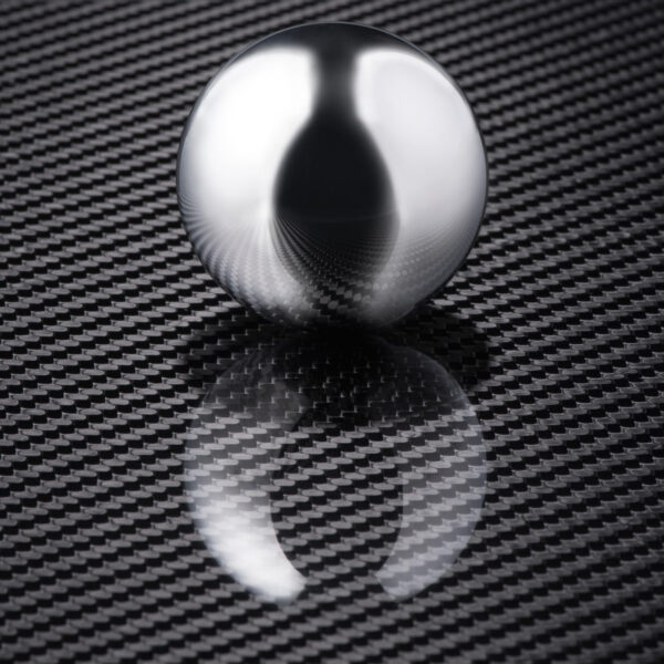 3k 2x2 Twill weave carbon fiber - with ball to display reflectiveness of gloss finish