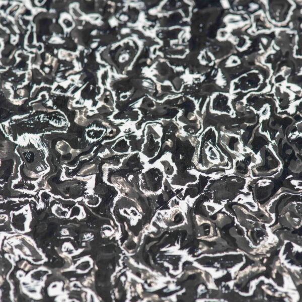 Snowfall marble carbon fiber closeup